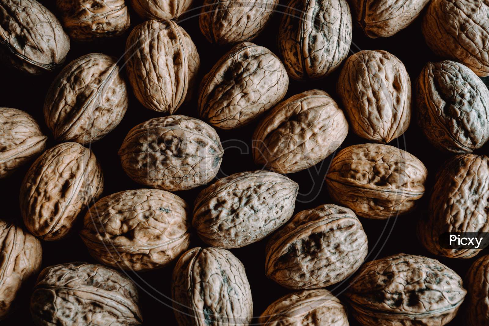 Background Filled With Nuts From Above