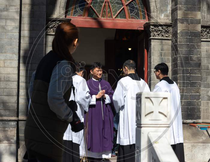 Chinese Catholic Priests At St. Michael Church In Beijing