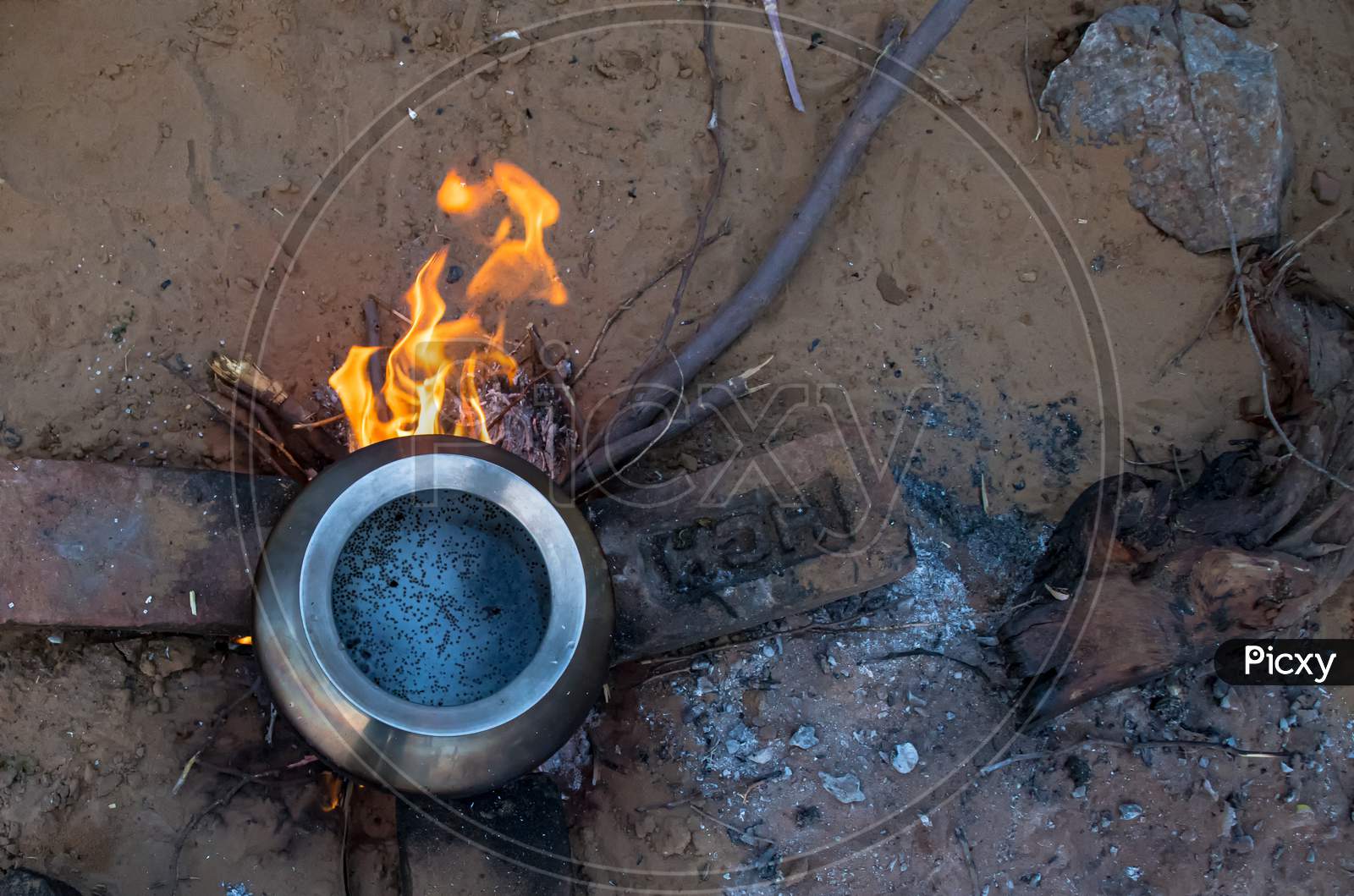 Cooking Food In Traditional Chulha (Stove).