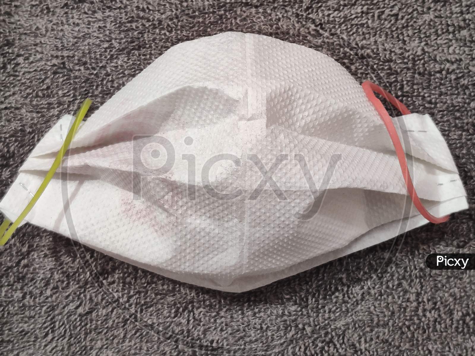 COVID-19 pandemic. antiviral medical paper mask for protection against corona virus
