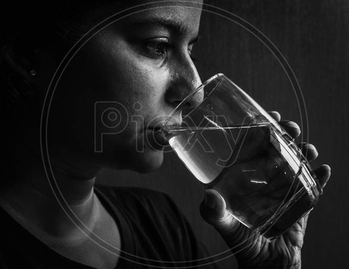 women drinking water