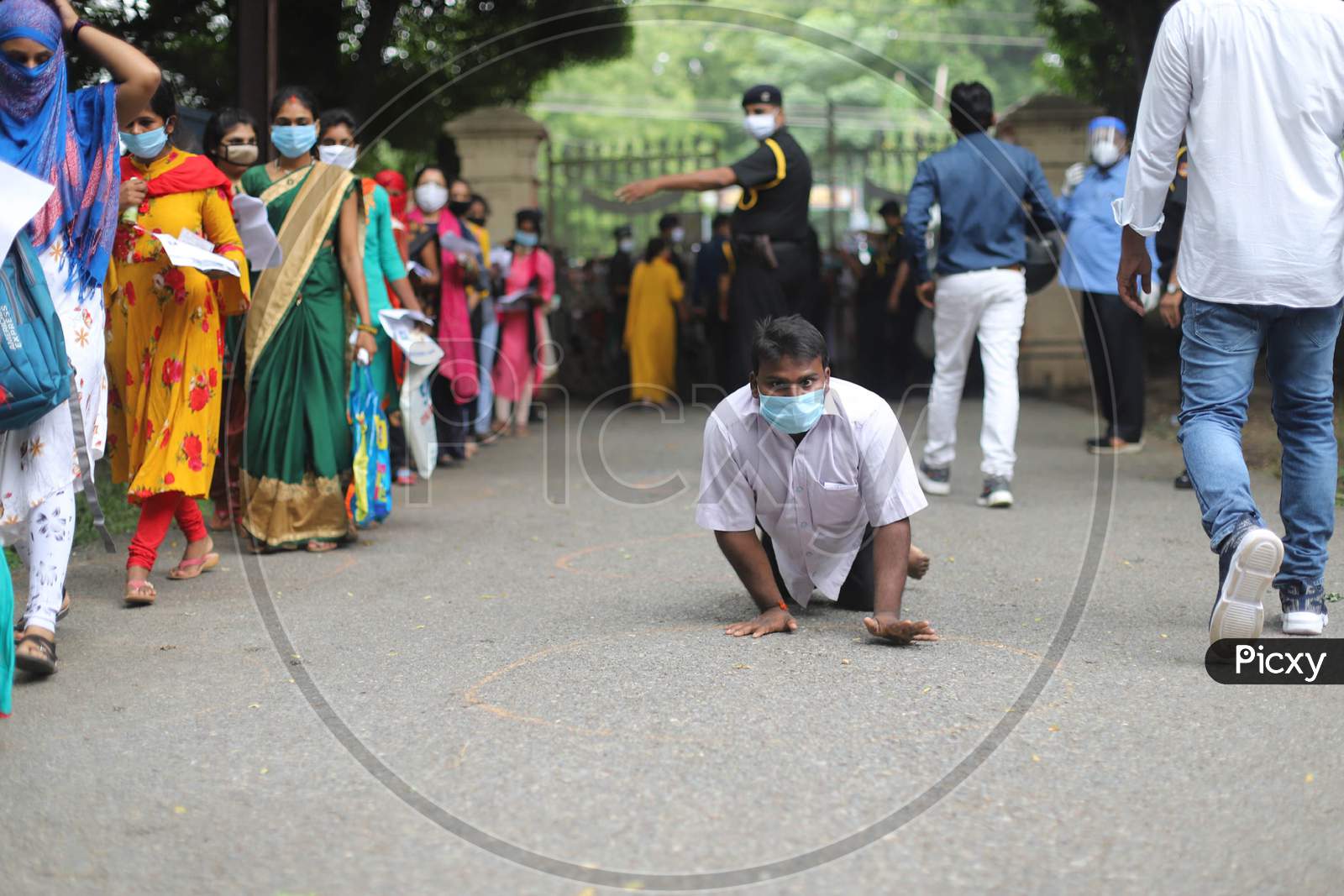 A differently abled Applicant Arrives To Attend B Ed Entrance Examination During Lockdown To Slow The Spread Of The Coronavirus Disease (Covid-19) At Allahabad Central University In Prayagraj, August 9, 2020.