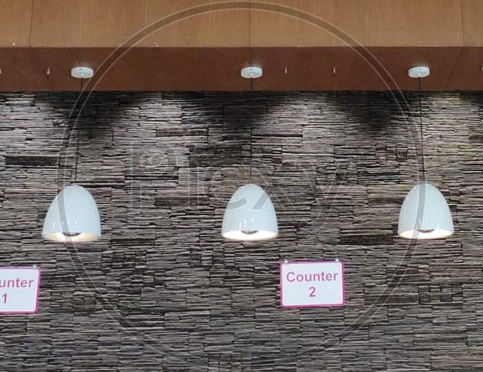 Hanging ceiling lights at the entrance
