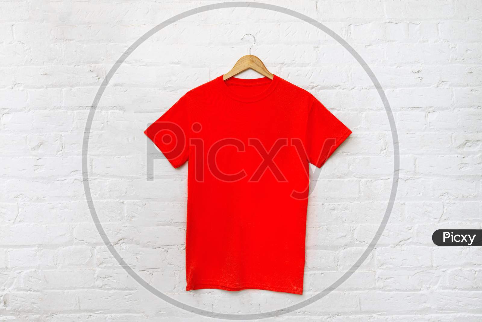 Red t-shirt on cloth hanger