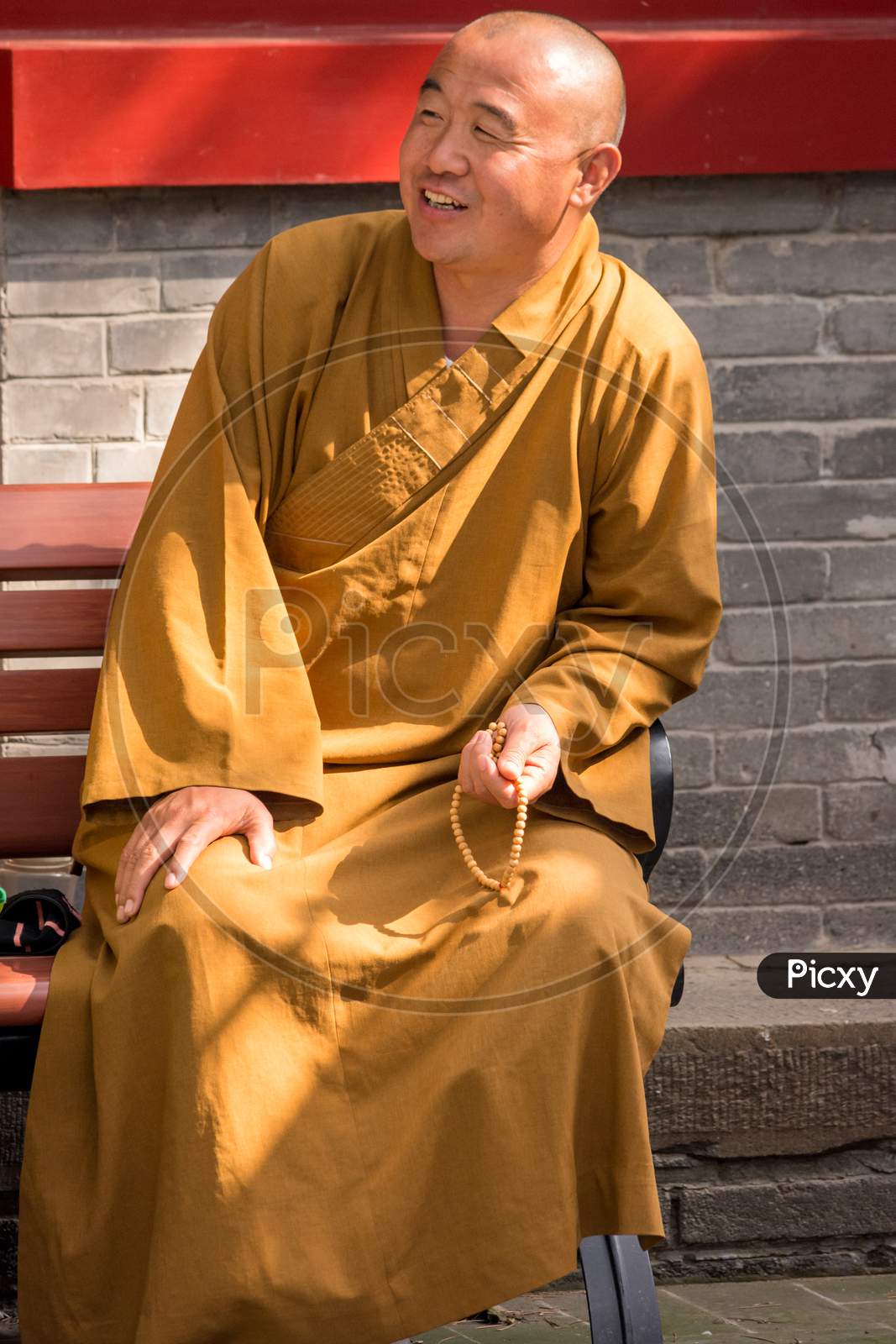 Buddhist Monk At The Badachu Buddhist Complex In Western Hills In Beijing, China