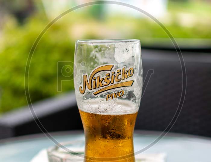 Glass Of Cold Niksic Beer, Served In A Restaurant In Belgrade, Serbia