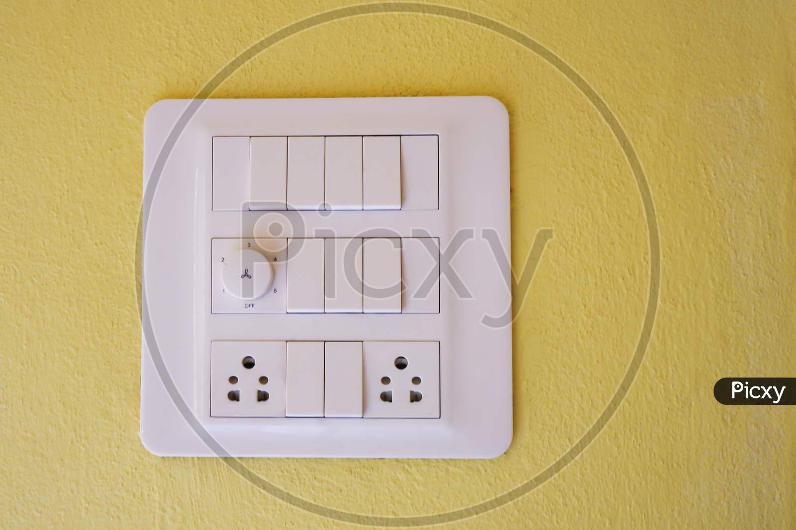 Modern Electrical Panel Isolated On Yellow Wall