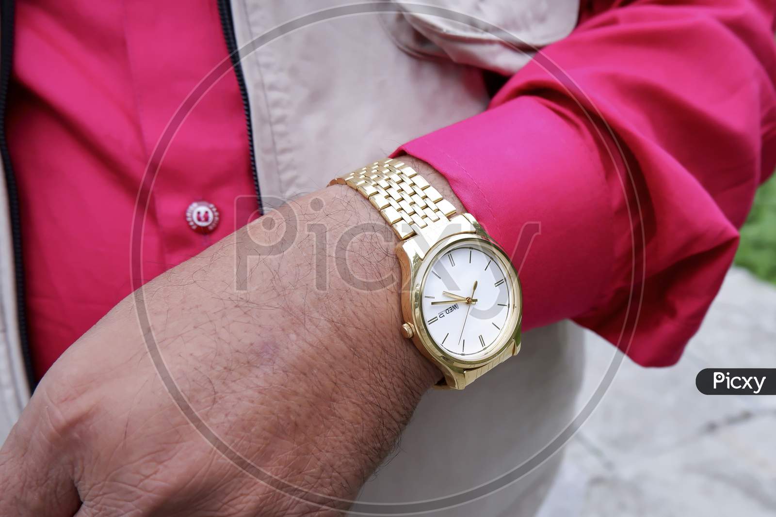 Close Shot Of Golden Watch Wearing Handsome Young Man