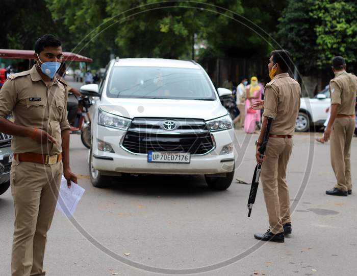 Policemen Checking Vehicles During Lockdown To Slow The Spread Of The Coronavirus Disease (Covid-19) At Allahabad Central University In Prayagraj, August 9, 2020.