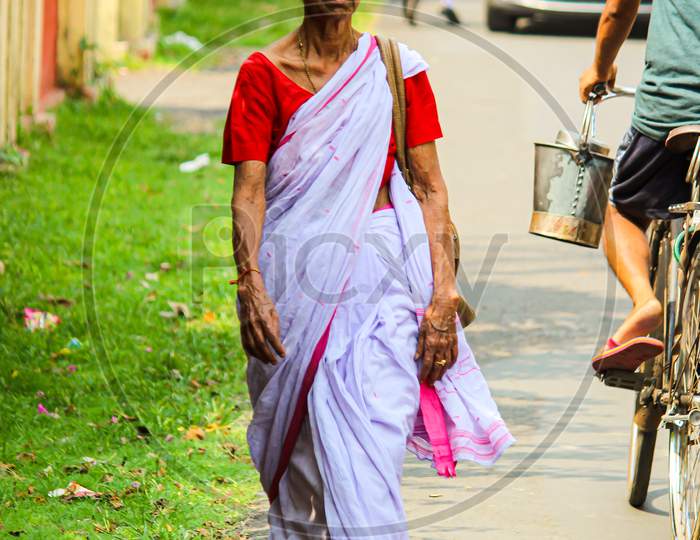 Old Women Wearing A Bengali Sari