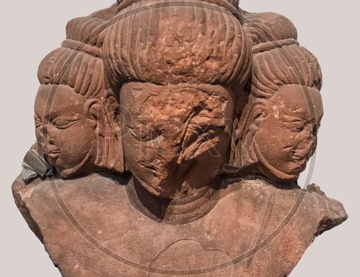Archaeological Sculpture Standing Of Bust Of Brahma, The Creator From Indian Mythology
