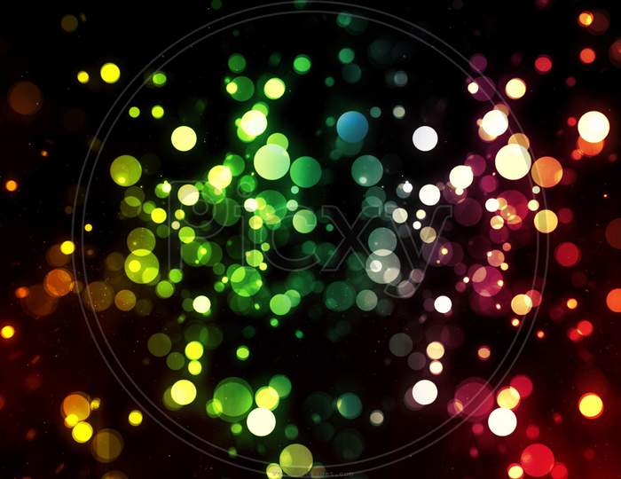 Colourful dotted light sparks in the dark background
