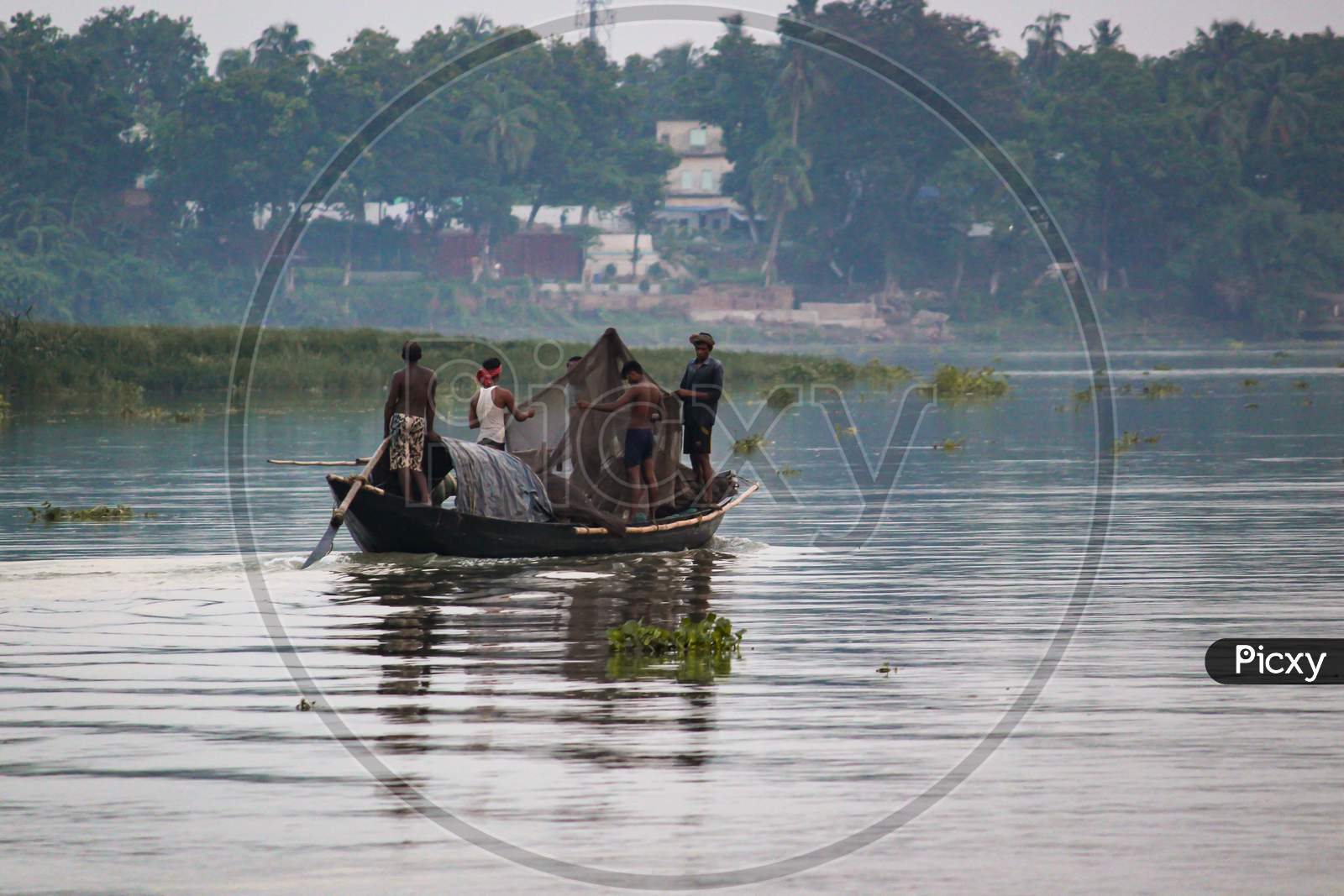 Fishermen Throwing Fishing Nets