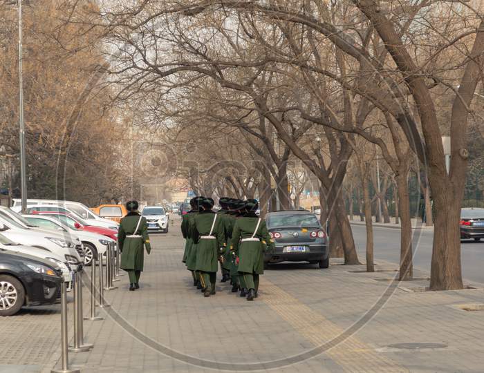 Squad Of The Chinese Peoples Armed Police Force Patrolling In Beijing, China