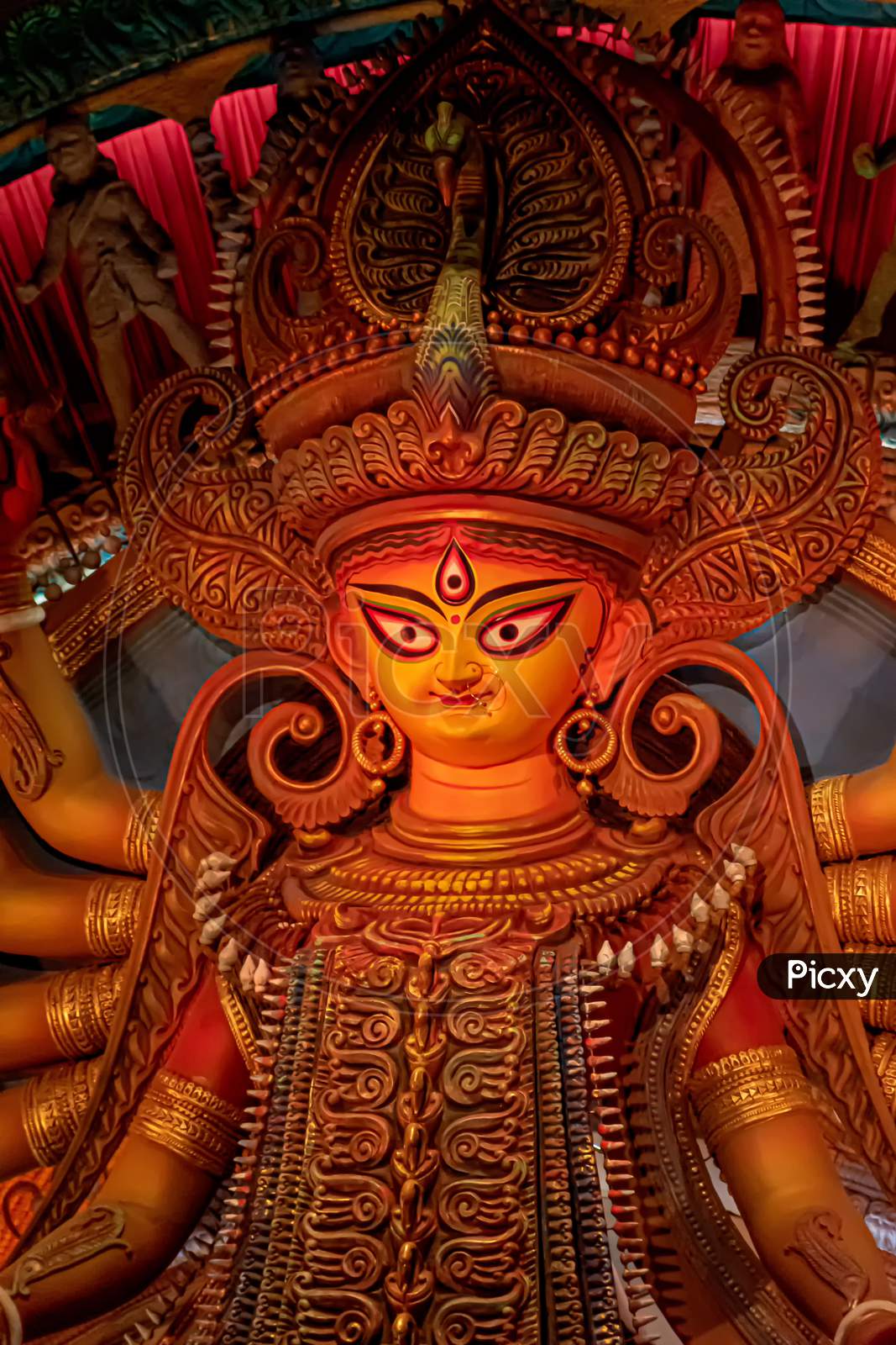 Goddess Durga Idol At Decorated Durga Puja Pandal, Shot At Colored Light, In Kolkata, West Bengal, India. Durga Puja Is Biggest Religious Festival Of Hinduism And Is Now Celebrated Worldwide.