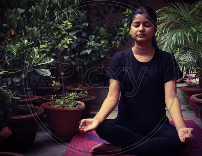 women doing yoga and meditation