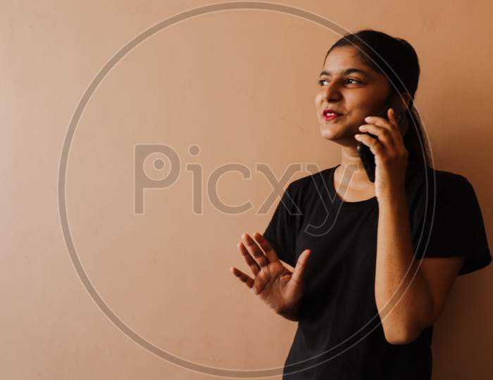 women talking on mobile phone with copy space