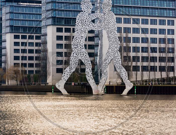 Olecule Man Aluminium Sculpture On The Spree River In Berlin, Germany