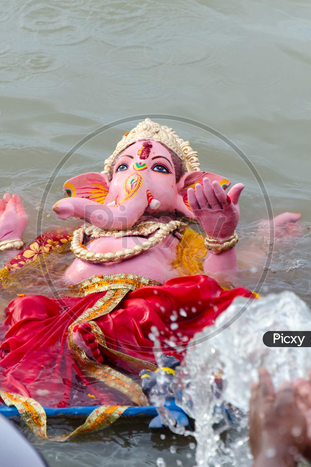 Immersion of Lord Ganesha idol in water
