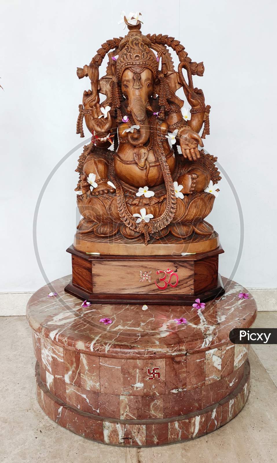 Lord Ganesha carved out of brown stone