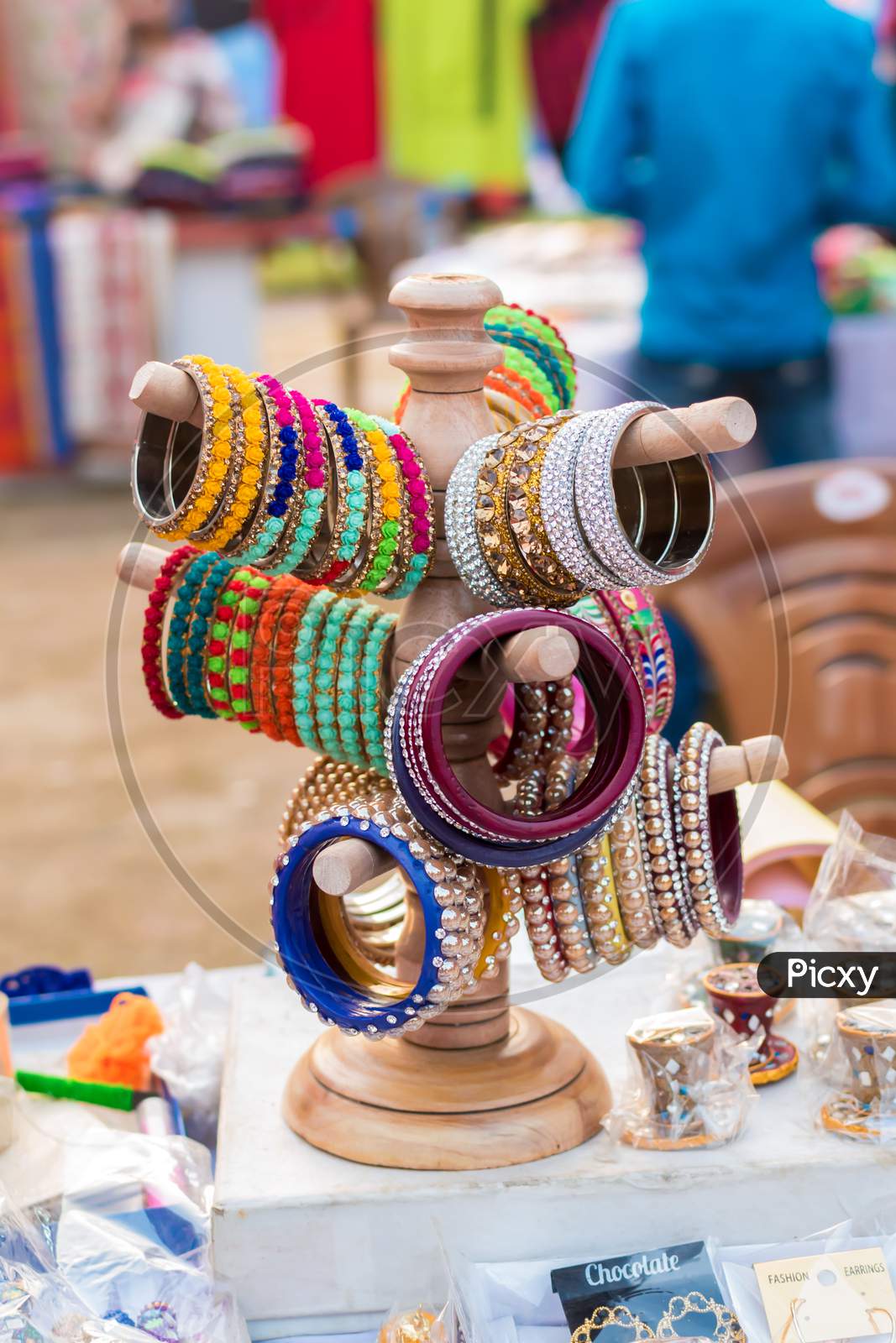 Indian Traditional Handmade Bangles With Blurred Background Is Displayed In A Street Shop For Sale. Indian Handicraft And Art