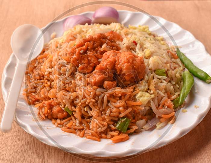 Chilli Chicken Is A Popular Indo-Chinese Appetizer Served With Vegetable Fried Rice.