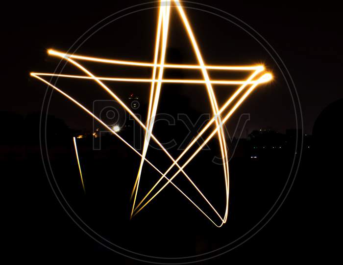Star Light Painting/Graffiti Is A Long Exposure Photography Technique