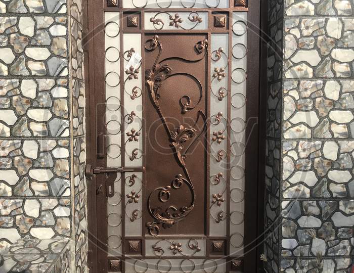 Brown Color Galvanized Enamel Painted Prefabricated Single Leaf Wicked Gate For An Villa Backside And Flower Designed In The Gate Shutter Page