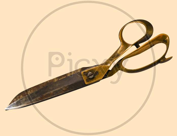 Rusty Tailor Scissor Isolated On Cream Color Background