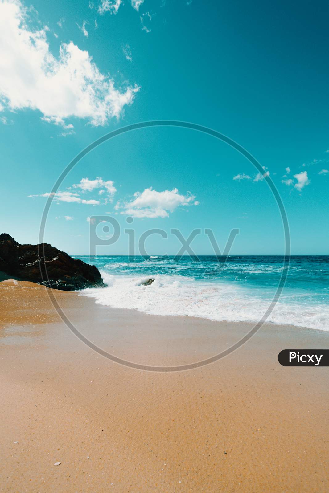 Bright Shot Of A Beach During A Sunny Day