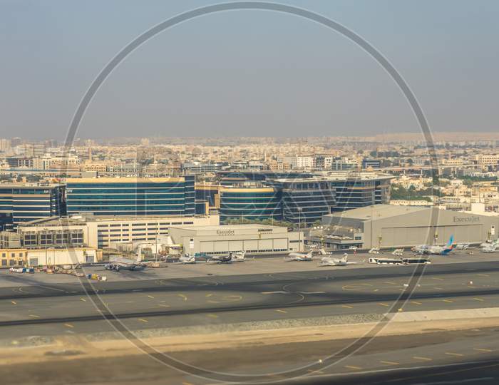 Dubai, Emirates - 18 November 2018: Emirates Plane Execujet And Bombardier Hangar At Airport At Dubai Parking