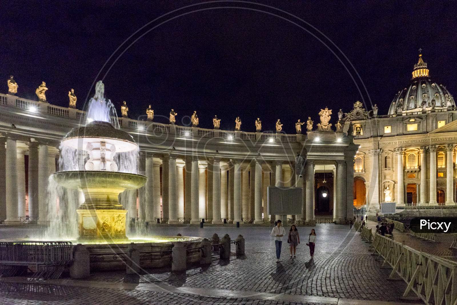 Vatican City,Italy - 23 June 2018: The Water Fountain Is Lit Up At St.Peters Square In Vatican City At Night