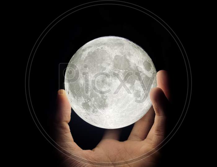 moon in  hand
