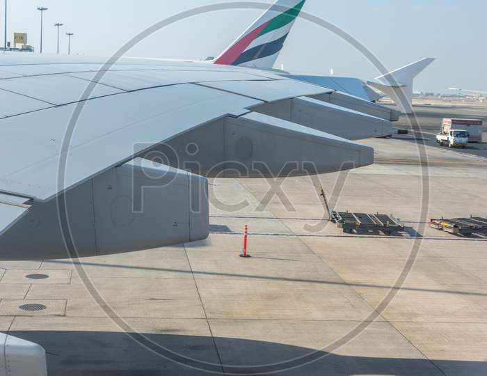 Dubai, Emirates - 18 November 2018: Wings Of Emirates Aeroplane At Dubai