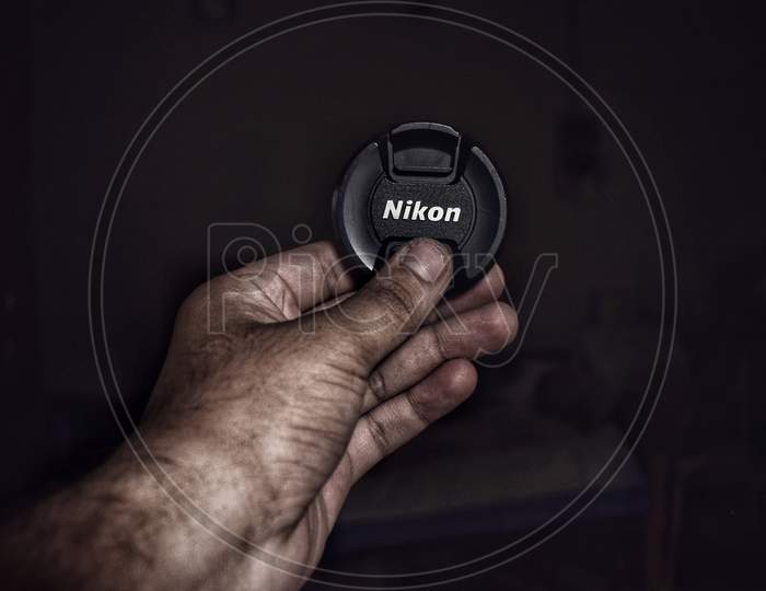 Nikon lense cap, dark photography