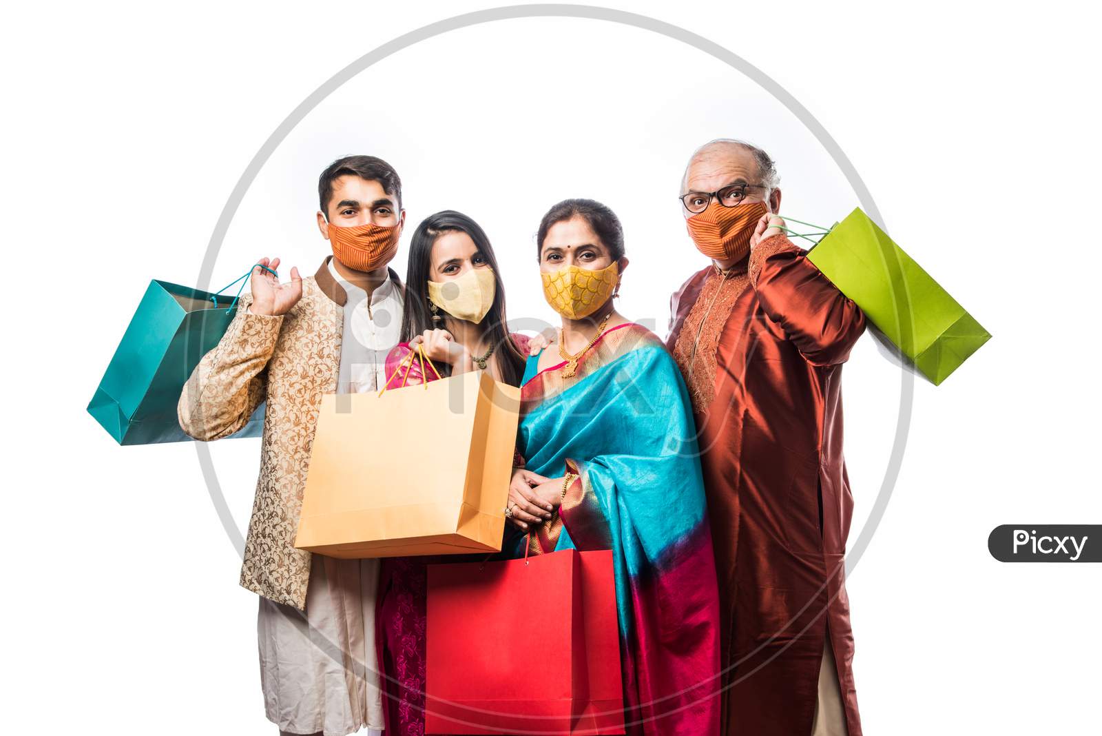 Indian Family Shopping For Diwali Or Wedding, Wears Face Mask