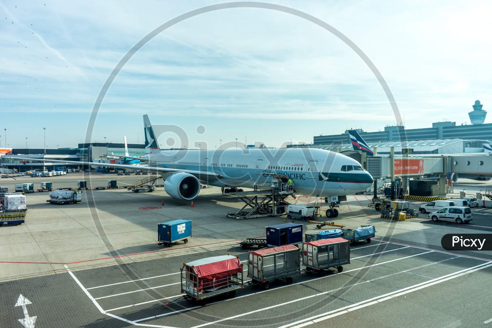 Schiphol, Amsterdam, Netherlands - 4 November 2018 : Cathay Pacific Planes Waiting At The Airport Dock