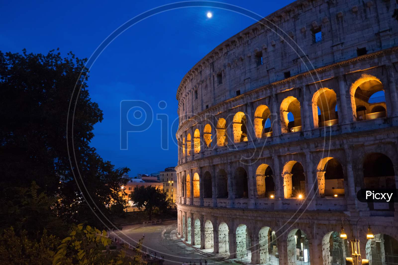Night At The Great Roman Colosseum (Coliseum, Colosseo), Also Known As The Flavian Amphitheatre With Lights & Illumination.