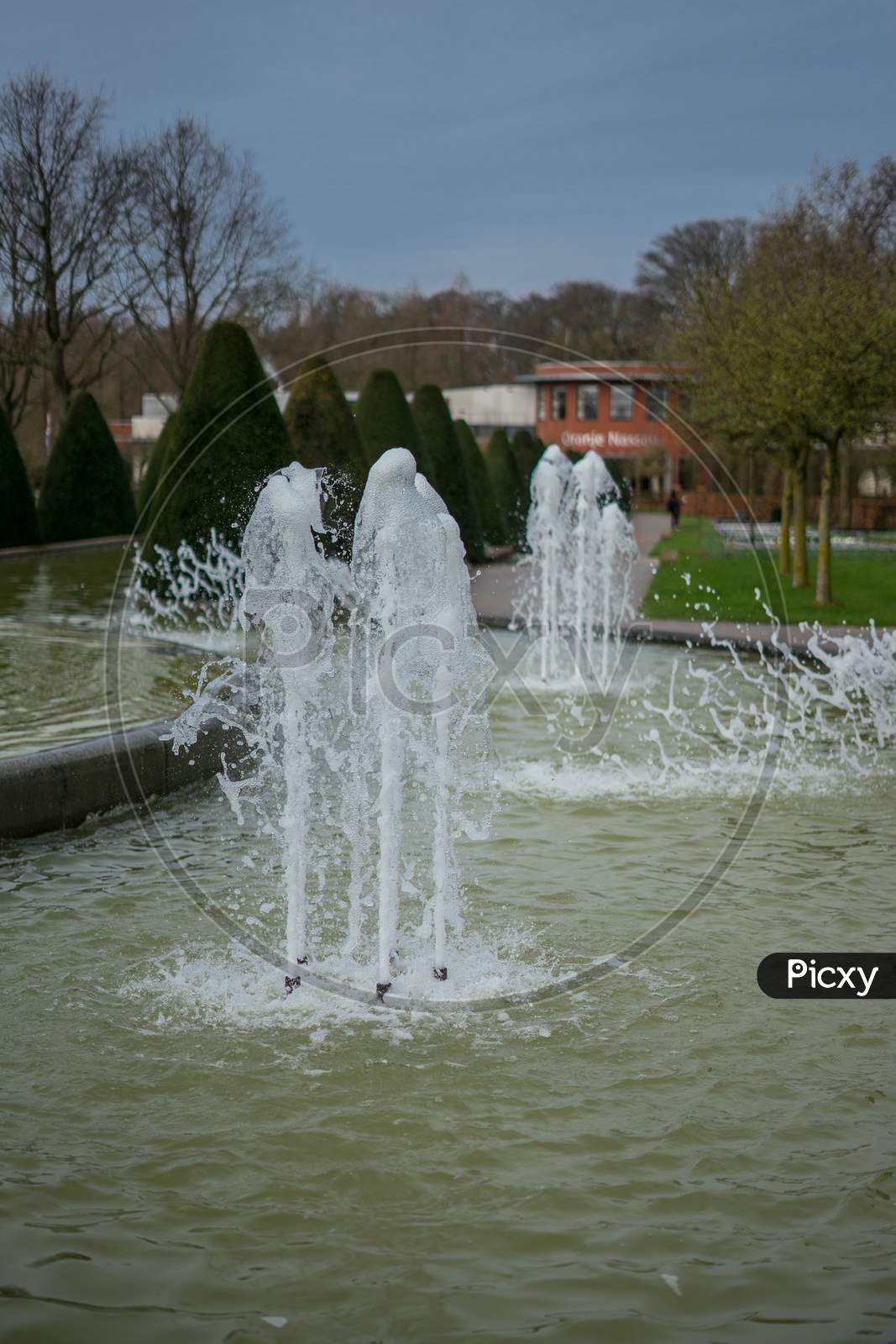 Flower Garden, Netherlands , A Close Up Of A Water Fountain
