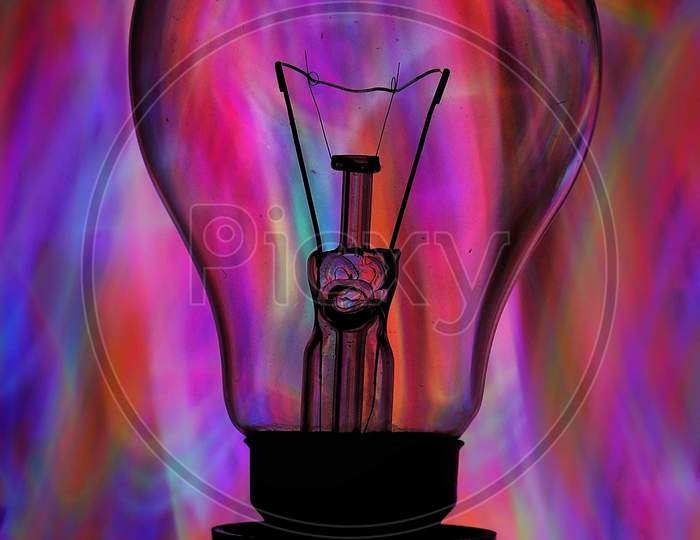 Bulb with light painting in the background