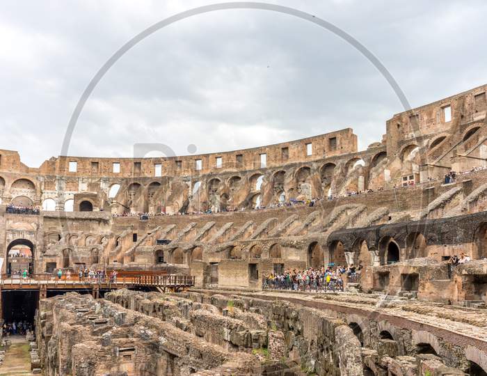 Rome, Italy - 23 June 2018: Interior Of The Roman Colosseum (Coliseum, Colosseo), Also Known As The Flavian Amphitheatre. Famous World Landmark. Scenic Urban Landscape.