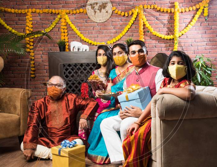 Indian Family In Group Wears Face Mask In Diwali Festival In Corona Pandemic