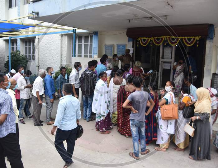 Image of People Flout Social Distancing Norms As They Stand In A Queue ...