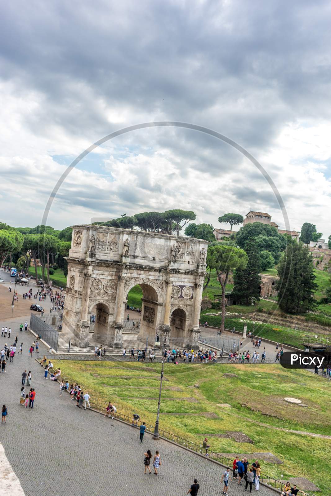 Rome, Italy - 23 June 2018: The Ancient Ruins Of The Arch Of Constantine At Rome Viewed From The Colosseum. Famous World Landmark. Scenic Urban Landscape.