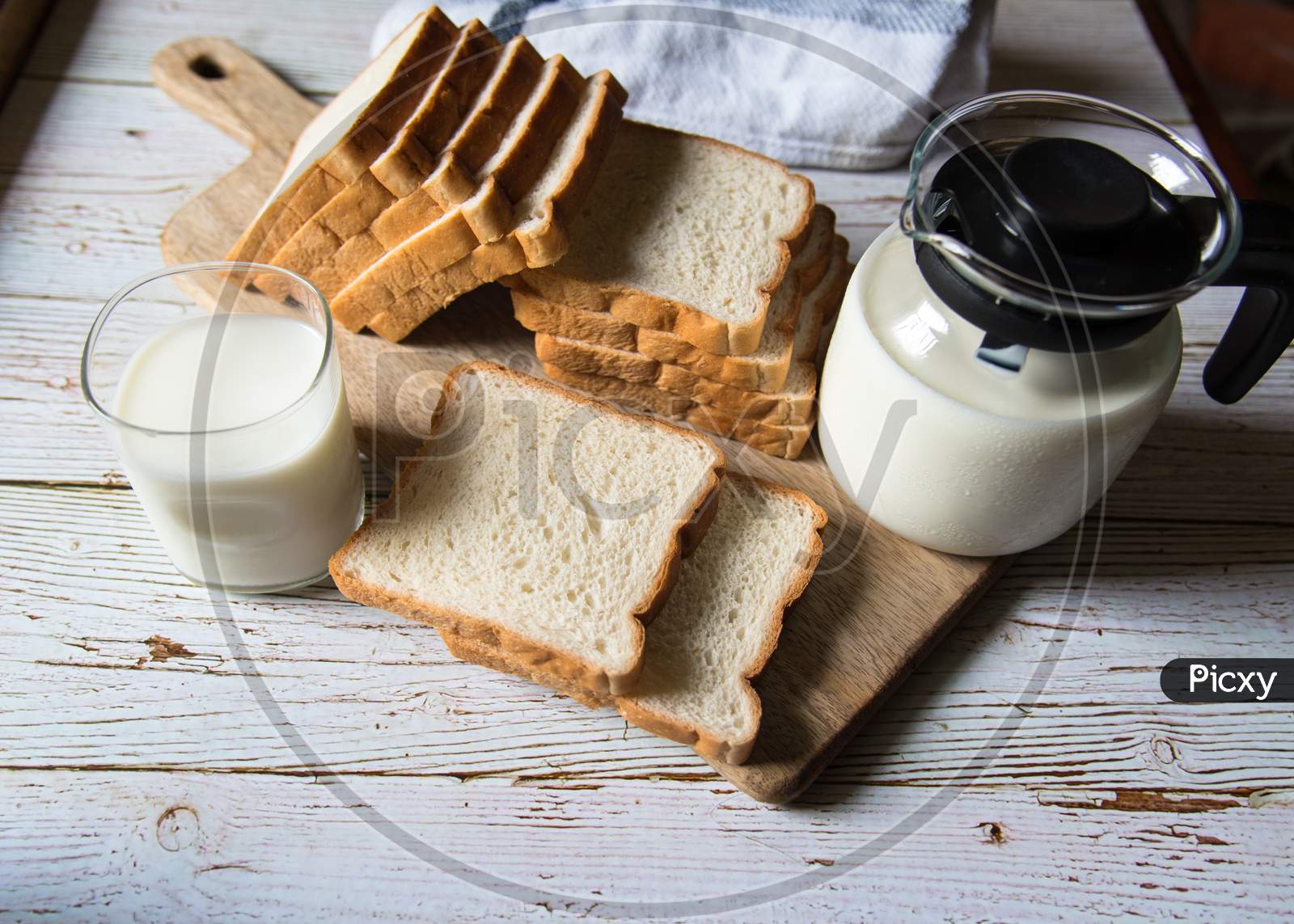 Close up view of bread slices and milk