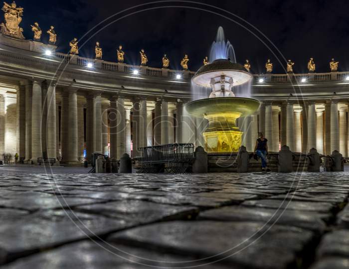 Vatican City,Italy - 23 June 2018: The Water Fountain Is Lit Up At St.Peters Square In Vatican City