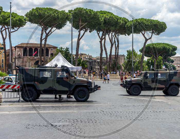 Rome, Italy - 23 June 2018: Armoured Trucks Standing Guard At Monument To Vittorio Emanuele Ii Viewed From Tomb Of The Unknown Soldier In Rome,Italy