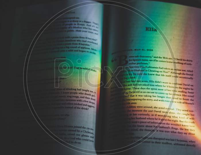 Giving the rainbow effect light to the Surface of the book