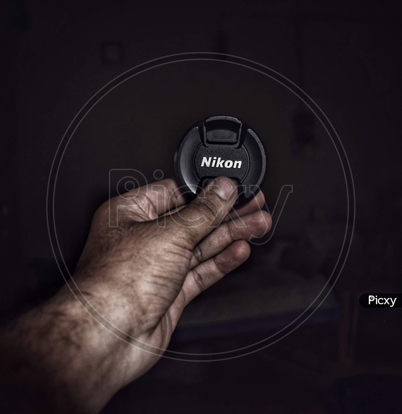 Nikon lense cap, dark photography