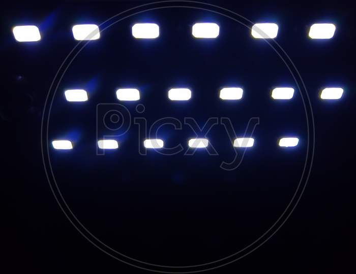 Small LED spotlight on black background